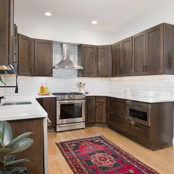 Urban Contemporary Dark Wood Kitchen | White Quartz, Subway Tile & Open Shelving