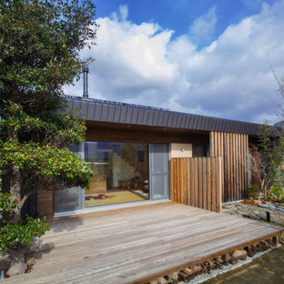 他の地域のアジアンスタイルのおしゃれなデッキ (日よけなし) の写真