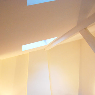 Rénovation d'un salon avec grande hauteur sous plafond