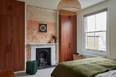 Mid-century modern bedroom photo in London