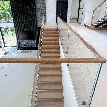Project #126 | Contemporary Staircases with Integrated LEDs & Glass Railing