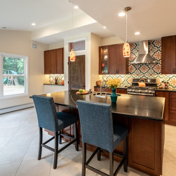Cheerful Multi Level Rear Addition to Expand Kitchen, Mudroom & Sunroom in Oakt