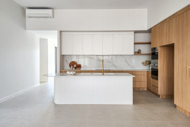 Photo of a beach style kitchen in Townsville.