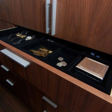 Hidden feline passageway in a luxury his-and-hers master closet