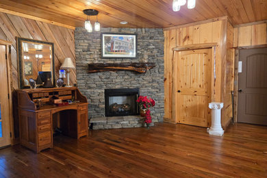 Inspiration for a rustic living room remodel in Other