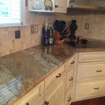 Kitchen in Typhoon Bordeaux Granite