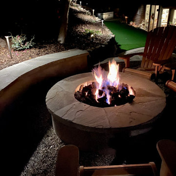 Challenging Hillside Putting green and Fire pit area