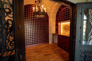 This is an example of a mediterranean wine cellar in Houston.