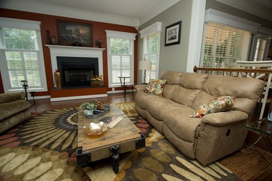Example of a large minimalist formal and open concept living room design in DC Metro with gray walls, a standard fireplace and a stone fireplace