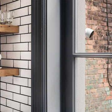 Intelligent Indoor and Outdoor Cameras In Rustic Kitchen