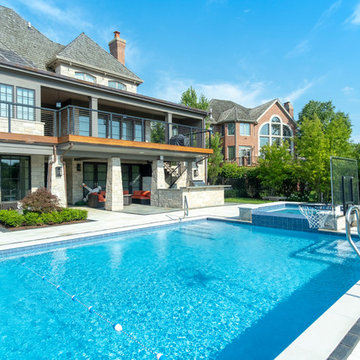 Burr Ridge Lap Pool with Raised Hot Tub and Waterfall