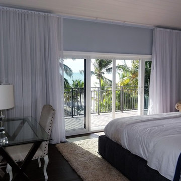 Ripple fold blackout and sheer drapes.