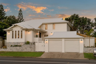 This is an example of a beach style two-storey exterior in Central Coast.