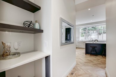 Transitional home design photo in Calgary