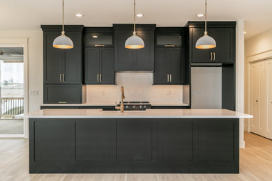 Example of a farmhouse kitchen design in Cedar Rapids