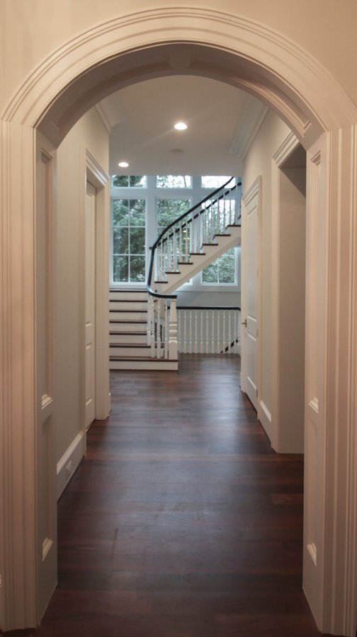 Powerful Impression by Floating Staircase in Suburban Foyer