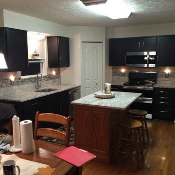 cabinet refacing--birch espresso cabinets with backsplash