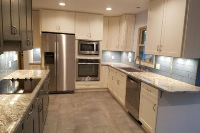 Example of a minimalist kitchen design in Milwaukee