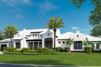 Mid-sized transitional white one-story stucco house exterior photo in Miami with a hip roof and a tile roof