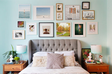 Eclectic bedroom in New York with blue walls.
