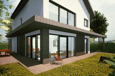 Diseño de fachada de casa gris actual de tamaño medio de dos plantas con revestimiento de madera y panel y listón