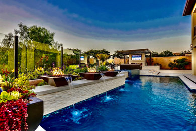 Inspiration for a contemporary pool remodel in Orange County