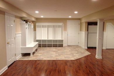 Inspiration for a mid-sized timeless basement remodel in New York
