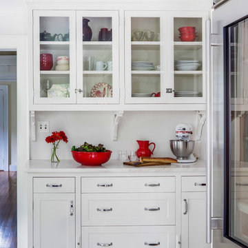 Glass door hutch in a cook's kitchen- Concord, MA
