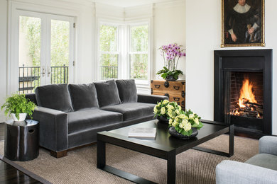 Large trendy enclosed dark wood floor living room photo in San Francisco with white walls, a standard fireplace, no tv and a metal fireplace