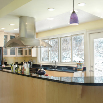 Contemporary Kitchen With Flat Panel Maple Cabinets