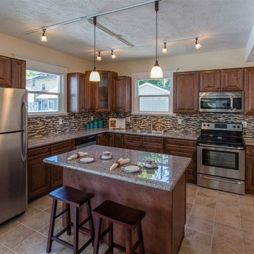 Chocolate Maple Cabinets with Prefabricated Orchird Granite