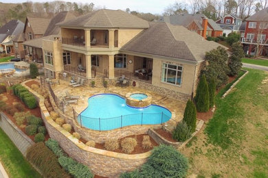 Example of a mountain style pool design in Other