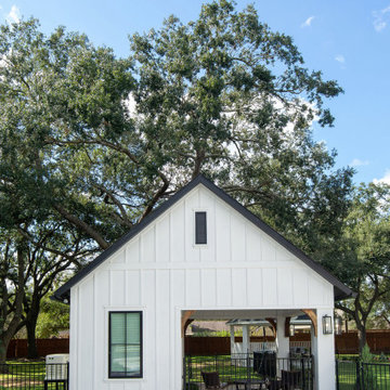 Modern Farmhouse with Reclaimed Brick and Board and Batten