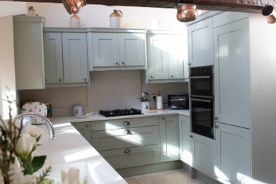 Traditional Shaker Painted Kitchen in Sage Green with Quartz for Cotswold Home