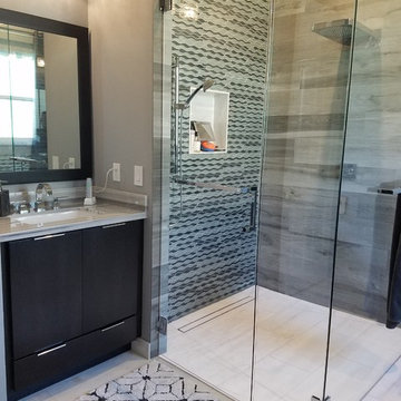 Master Bathroom Full Remodel Featuring Marble Floors and Countertops