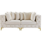 Meridian Furniture - Tremblay Velvet Upholstered 2-Piece Modular Sofa, Cream - Lean back and relax on this Tremblay sofa. Featuring soft cream velvet upholstery with deep button tufting, this sofa adds a bold touch to any living space. A complete set of gold and chrome legs are included, so you can change it up to suit your home decor. This sofa is modular, so you can create infinite configurations with it, which are easily attached using the latch underneath the frame. Its contemporary design is perfect for the modern home.