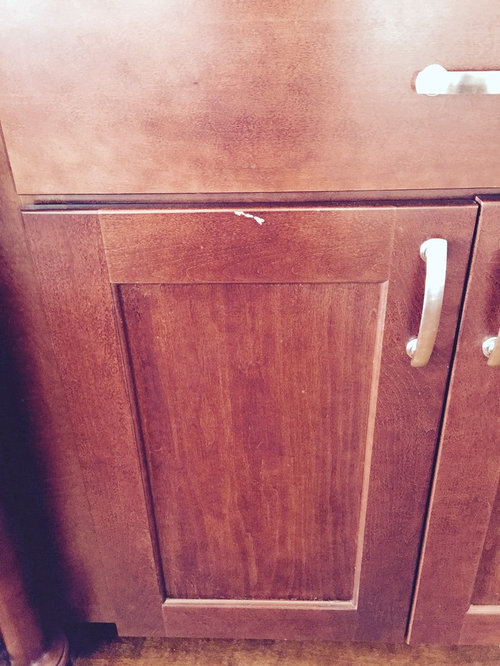 Repair man scratched wood floor and door! WWYD?