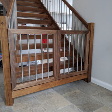 matching stair gates in Black Walnut with stainless steel spindles