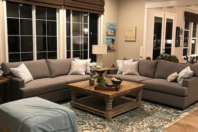 Living room - large contemporary formal and open concept medium tone wood floor and beige floor living room idea in San Diego with beige walls, no fireplace and no tv