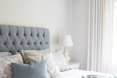 Small transitional master dark wood floor bedroom photo in Toronto with white walls and no fireplace