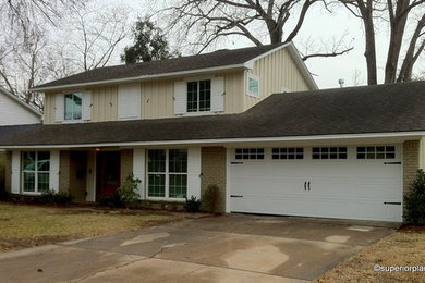 Example of a mid-sized classic two-story exterior home design in Dallas