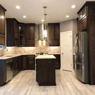 Design ideas for a small u-shaped kitchen pantry in Salt Lake City with an undermount sink, flat-panel cabinets, dark wood cabinets, quartz benchtops, coloured appliances, ceramic floors, with island, grey floor and white benchtop.
