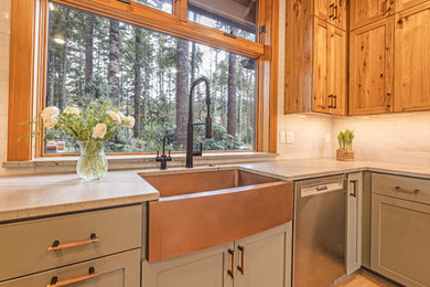 Inspiration for a large rustic u-shaped light wood floor and brown floor eat-in kitchen remodel in Other with a farmhouse sink, shaker cabinets, quartzite countertops, gray backsplash, ceramic backsplash, stainless steel appliances, a peninsula and gray countertops