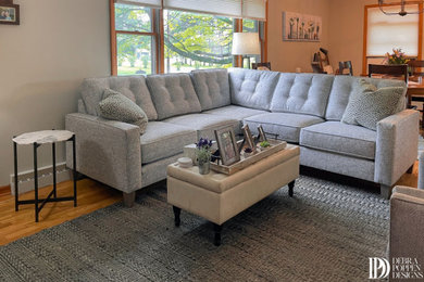 Living room - country living room idea in Grand Rapids