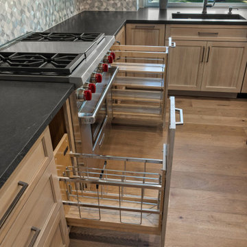 Custom Pull-out Spice Rack and Utensil Organizer in Light Oak Kitchen