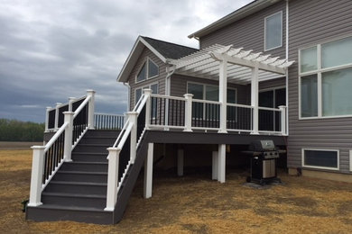 Composite deck with vinyl pergola on new custom home south Fort Wayne