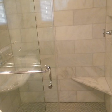 BATHROOM - Calcutta Gold Marble Shower / Gray Penny Tile Floor
