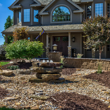Bubbling Boulder Embedded in Luxury Front Yard Softscape