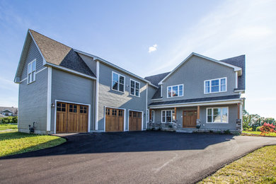 Large craftsman gray two-story mixed siding exterior home idea in Burlington