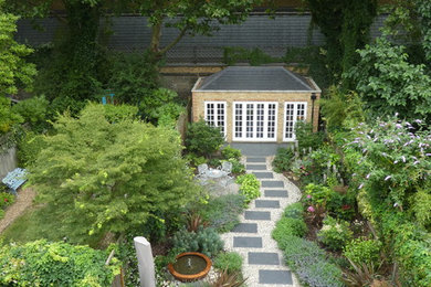 Mid-sized backyard garden in Cheshire.